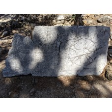 Stone slab with cross and circle